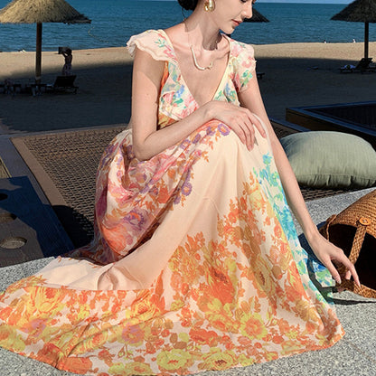 Women's V-Neck Ruffle Sleeve Floral Print Backless Maxi Dress - French-Style Beach Dress