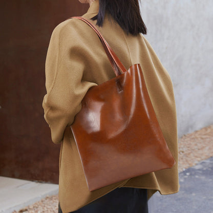 Women's Genuine Cowhide Leather Bag - Stylish and Simple Design with Double Straps