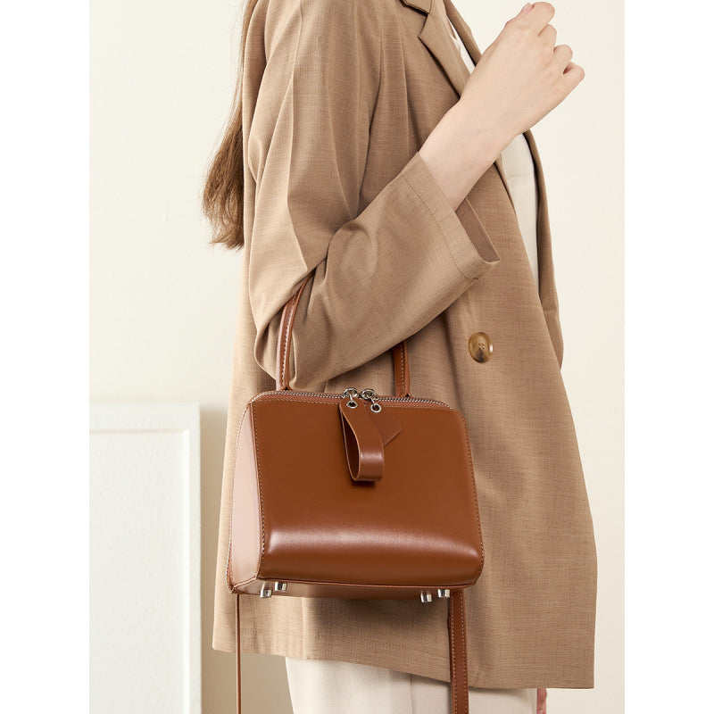 Women's Versatile Cowhide Leather Handbag with Open Grain Texture