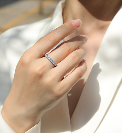 0.1 Carat Moissanite Sterling Silver Ring - Platinum Plated Wedding Band