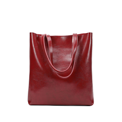 Women's Genuine Cowhide Leather Bag - Stylish and Simple Design with Double Straps