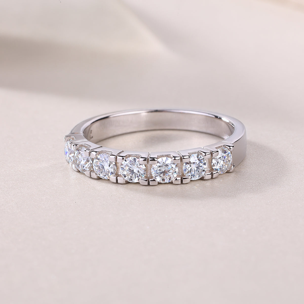 0.1 Carat Moissanite Sterling Silver Ring - Platinum Plated Wedding Band