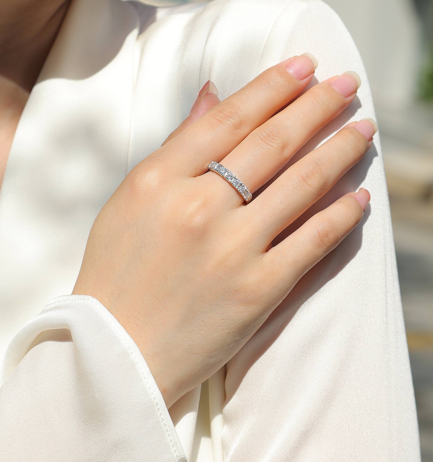0.1 Carat Moissanite Sterling Silver Ring - Platinum Plated Wedding Band