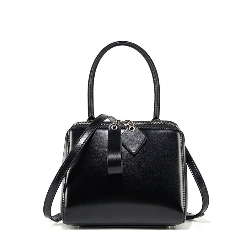 Women's Versatile Cowhide Leather Handbag with Open Grain Texture
