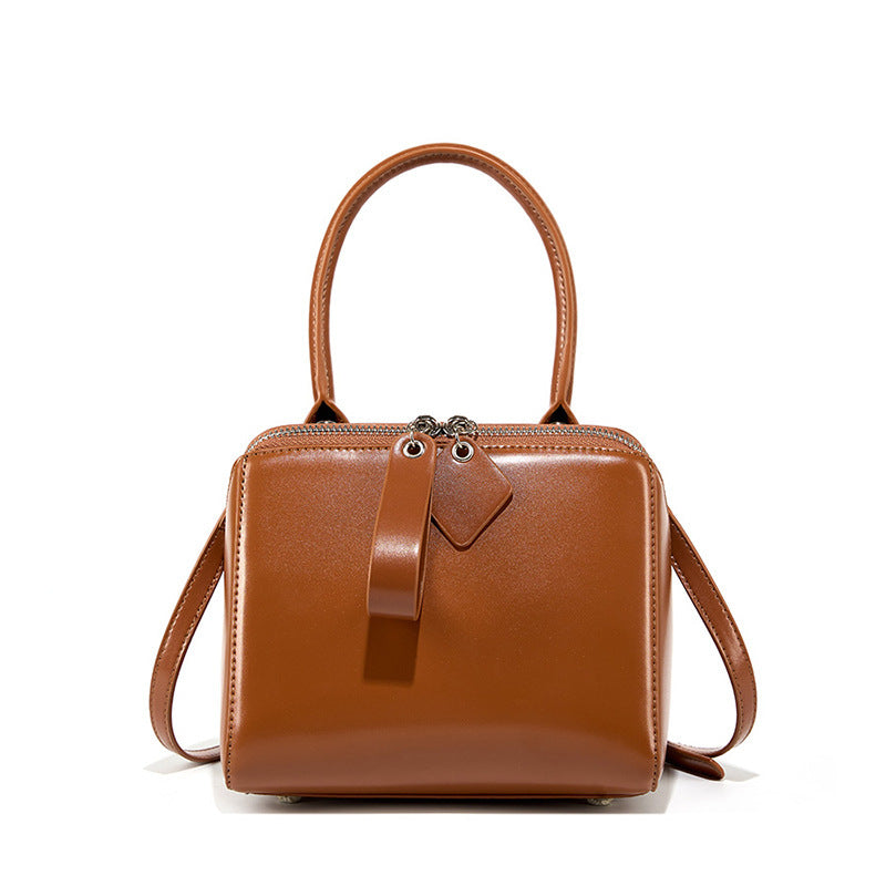 Women's Versatile Cowhide Leather Handbag with Open Grain Texture