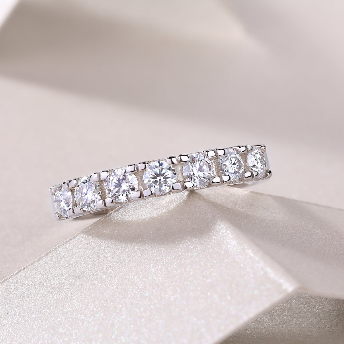 0.1 Carat Moissanite Sterling Silver Ring - Platinum Plated Wedding Band