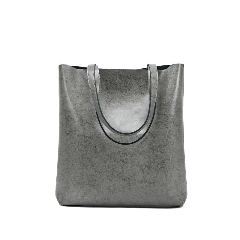 Women's Genuine Cowhide Leather Bag - Stylish and Simple Design with Double Straps