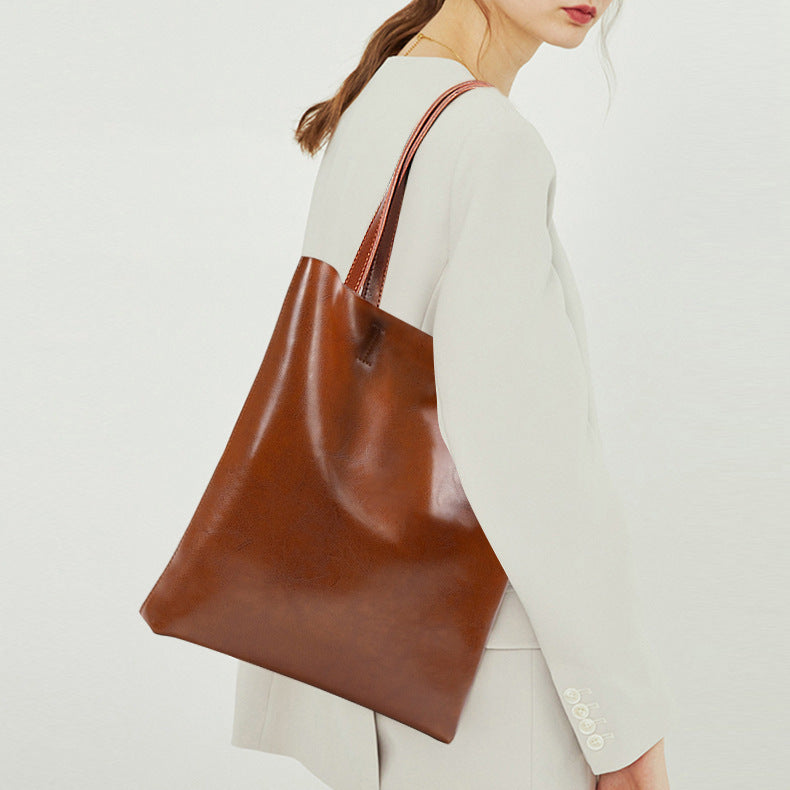 Women's Genuine Cowhide Leather Bag - Stylish and Simple Design with Double Straps