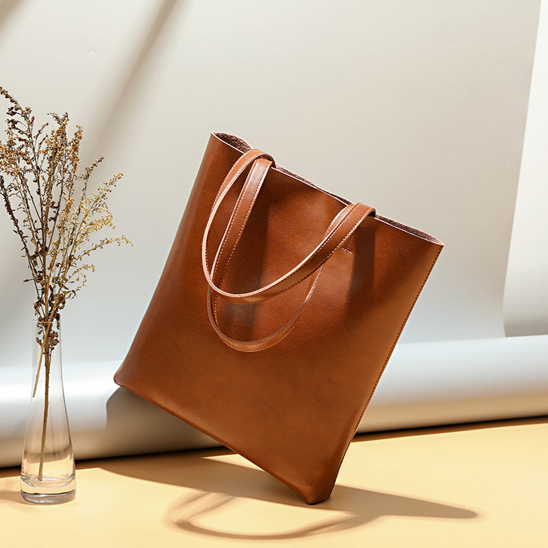 Women's Genuine Cowhide Leather Bag - Stylish and Simple Design with Double Straps